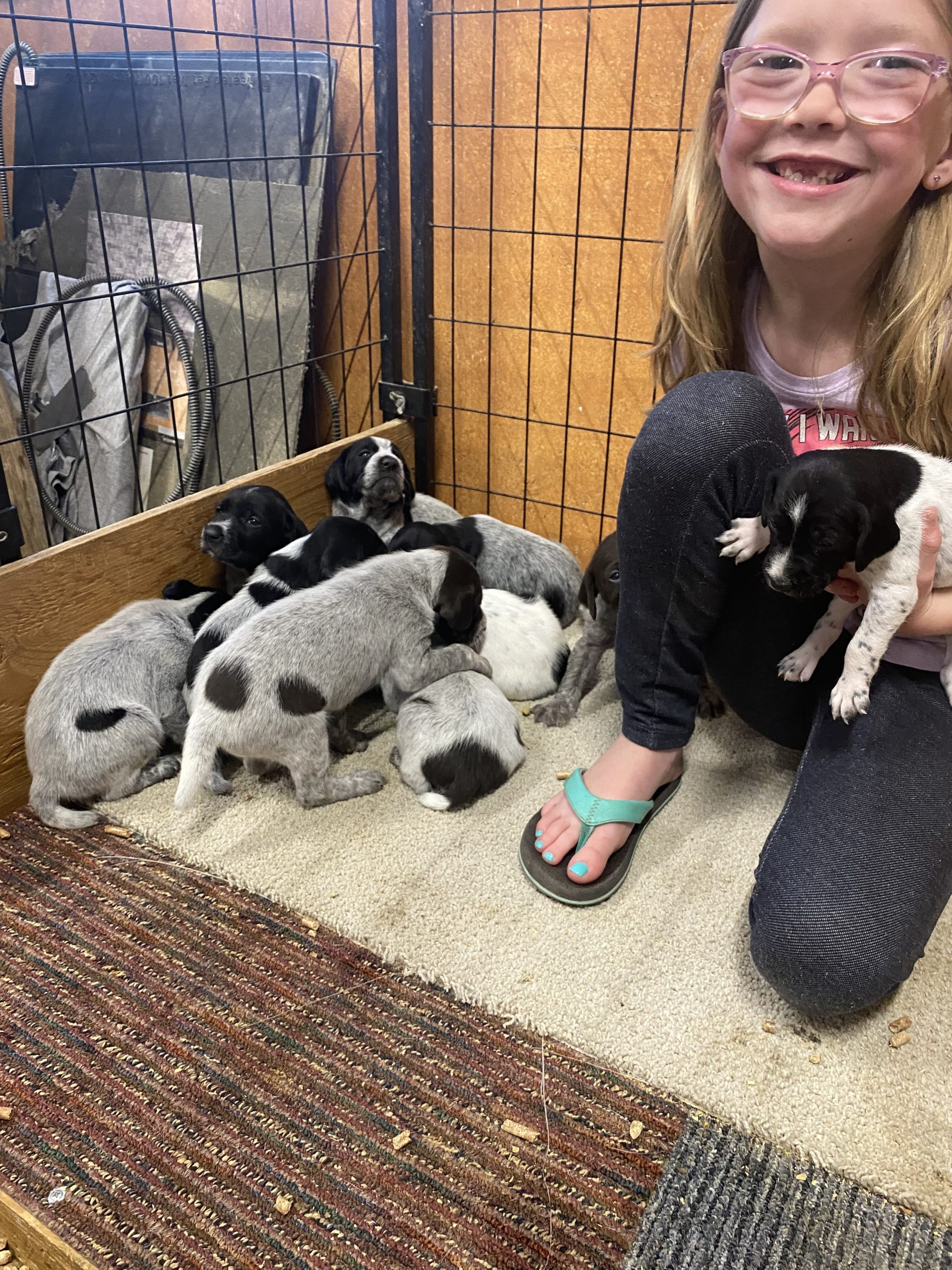 Rayna loving on the puppies. 